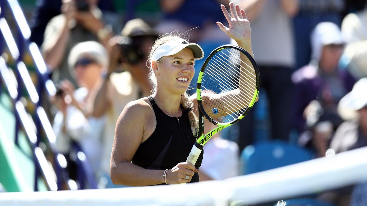 Caroline Wozniacki of Denmark reacts to winning her semi-final match against Angelique Kerber of Germany on day eight of the Nature Valley International at Devonshire Park.