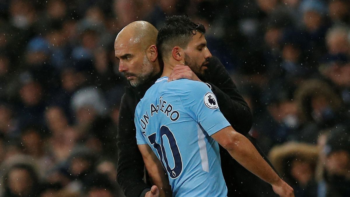 Manchester City's Sergio Aguero with manager Pep Guardiola as he is substituted
