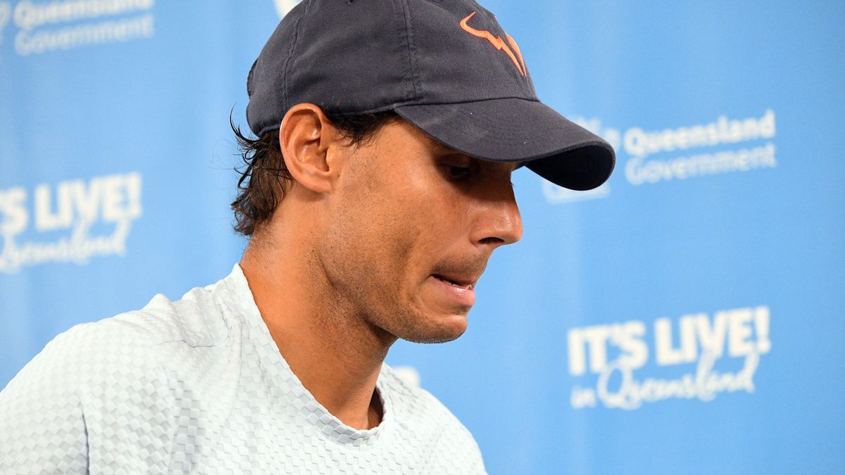 Rafael Nadal of Spain leaves after a press conference at the Brisbane International tennis tournament