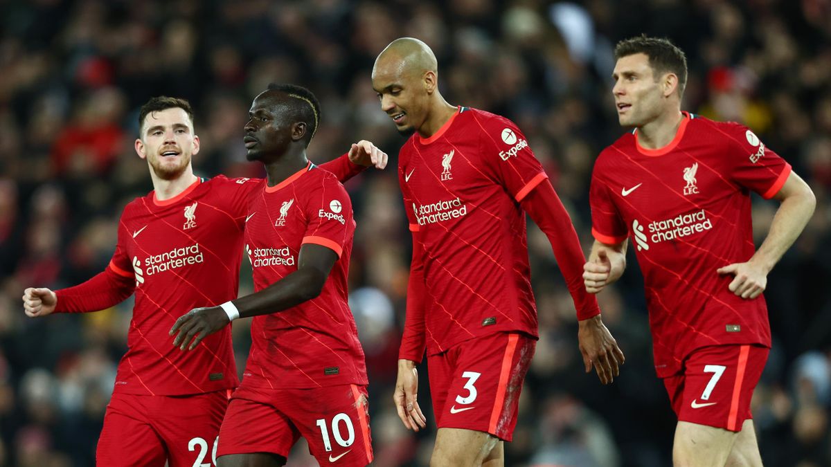 Sadio Mane of Liverpool celebrates with teammates after scoring their team's fourth goal during the Premier League match between Liverpool and Leeds United at Anfield on February 23, 2022 in Liverpool, England.