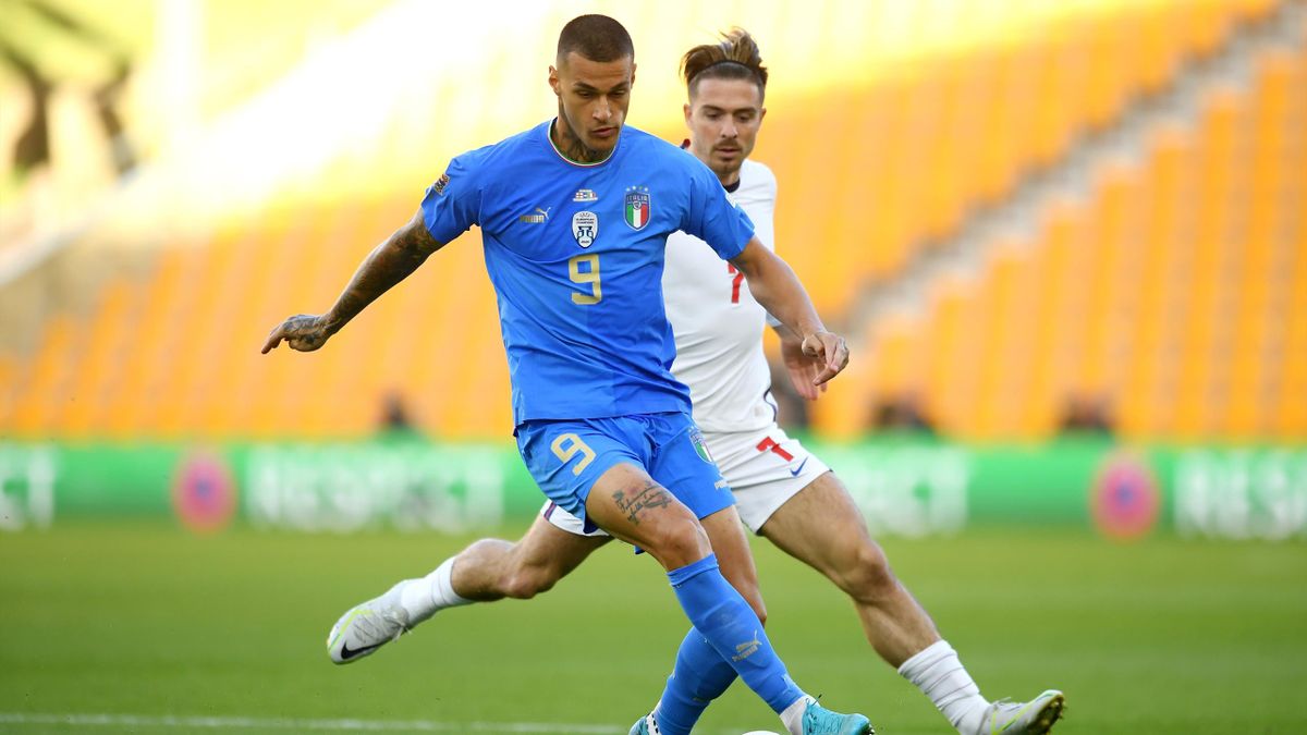 Gianluca Scamacca holds off  Jack Grealish during the UEFA Nations League match between England and Italy at Molineux on June 11, 2022 in Wolverhampton, England
