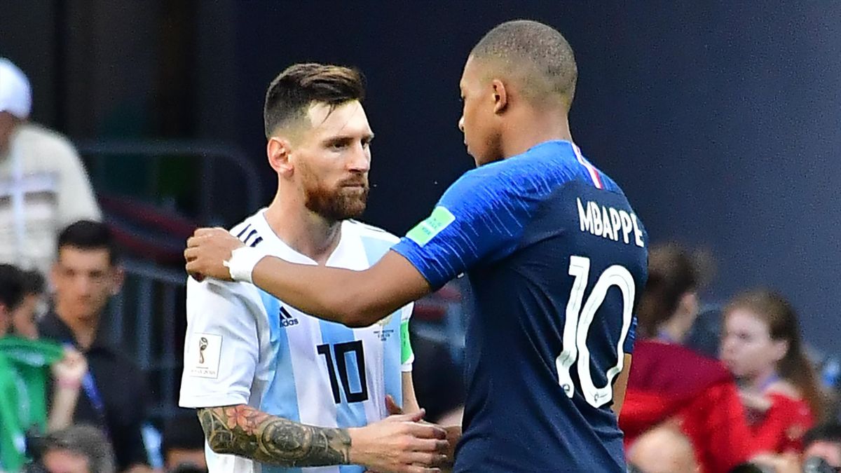 Argentina's forward Lionel Messi congratulates France's forward Kylian Mbappe (R) at the end of the Russia 2018 World Cup round of 16 football match between France and Argentina at the Kazan Arena in Kazan on June 30, 2018