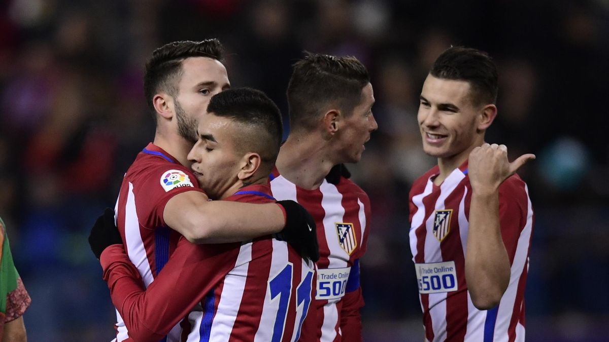 Atletico Madrid players celebrate their second goal during the Spanish Copa del Rey (King's Cup) round of 32 second leg football match Club Atletico de Madrid vs CD Guijuelo
