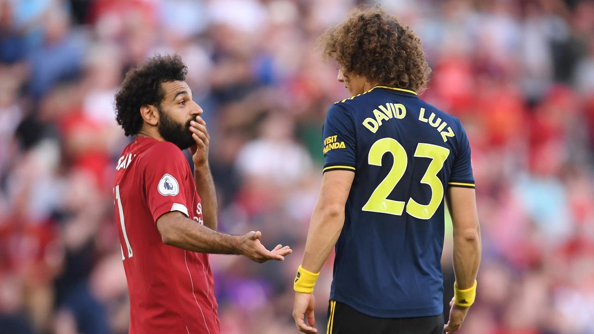 Mohamed Salah of Liverpool and David Luiz of Arsenal have a discussion after during the Premier League match between Liverpool FC and Arsenal FC at Anfield on August 24, 2019 in Liverpool, United Kingdom