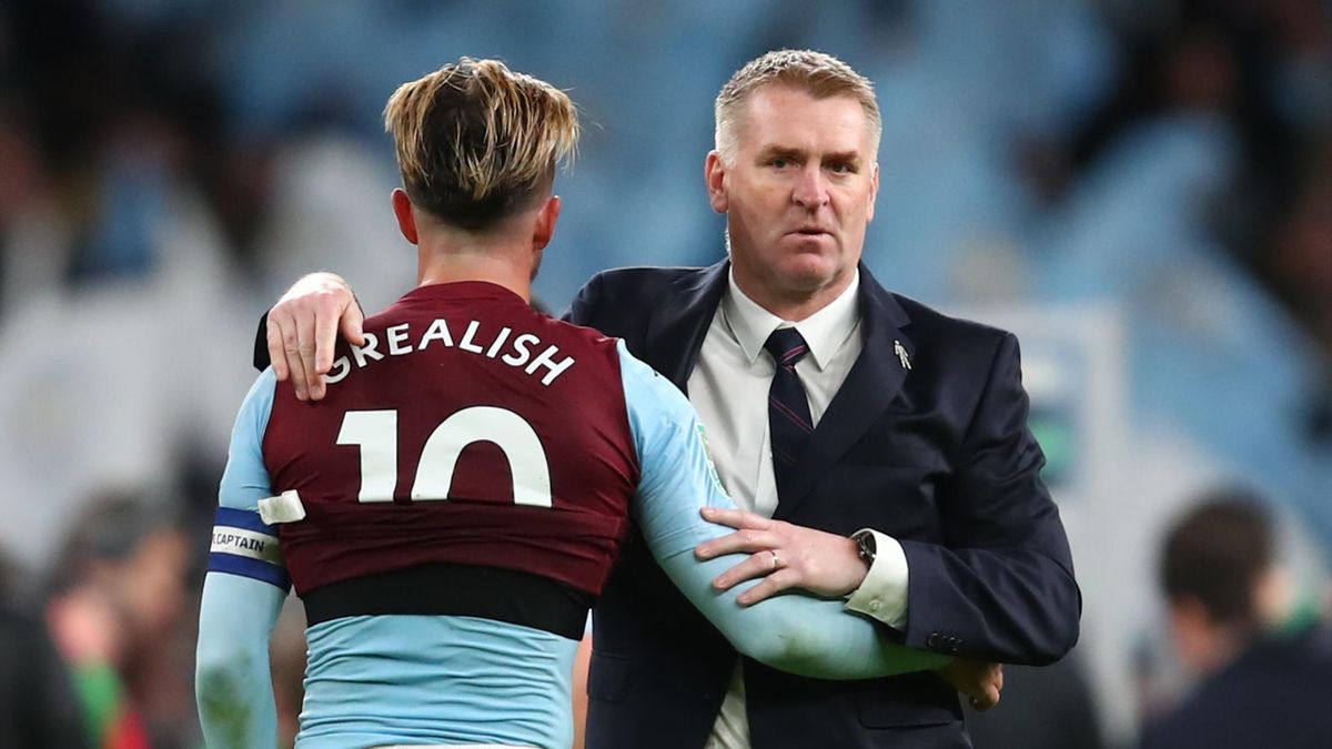 Jack Grealish of Aston Villa is consoled by Aston Villa manager Dean Smith during the Carabao Cup Final between Aston Villa and Manchester City at Wembley Stadium on March 1, 2020 in London, England.