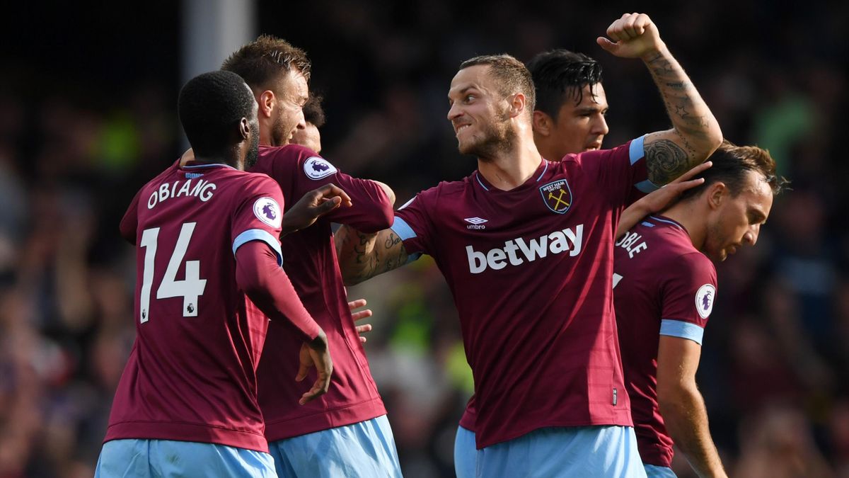 Andriy Yarmolenko of West Ham United celebrates with teammates after scoring his team's second goal