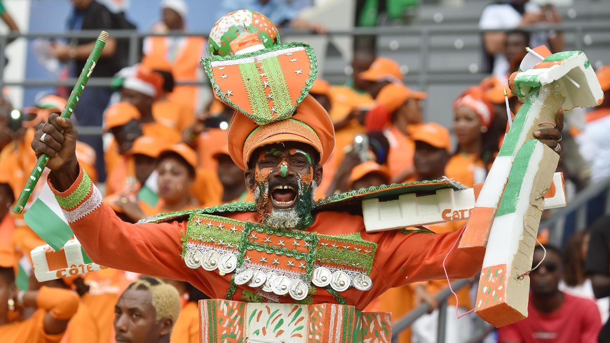 An Ivory Coast supporter cheers for his team ahead of the 2017 Africa Cup of Nations group C football match between Ivory Coast and DR Congo in Oyem on January 20, 2017