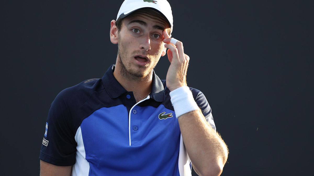 Elliot Benchetrit of France reacts during his Men's Singles first round match against Yuichi Sugita of Japan on day two of the 2020 Australian Open