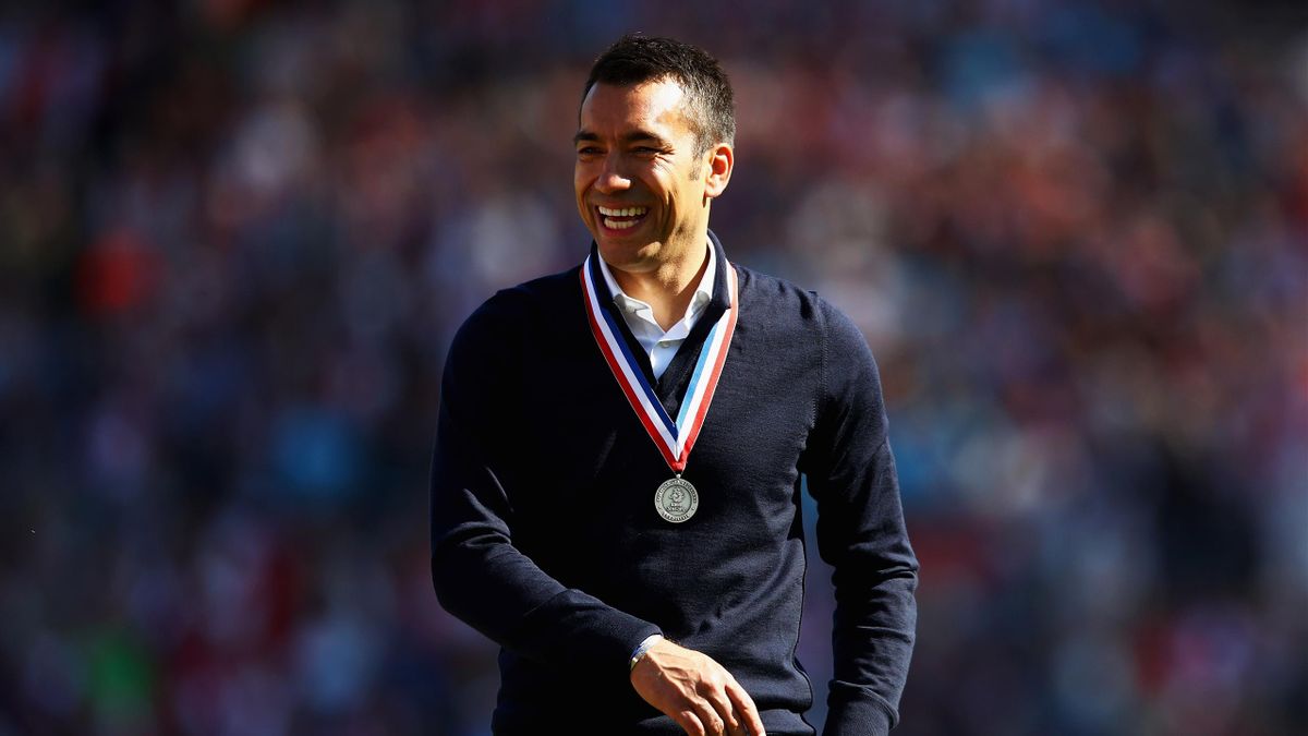 Manager/Head Coach, Giovanni van Bronckhorst celebrates in front of the home fans after winning the Dutch Eredivisie at De Kuip or Stadion Feijenoord