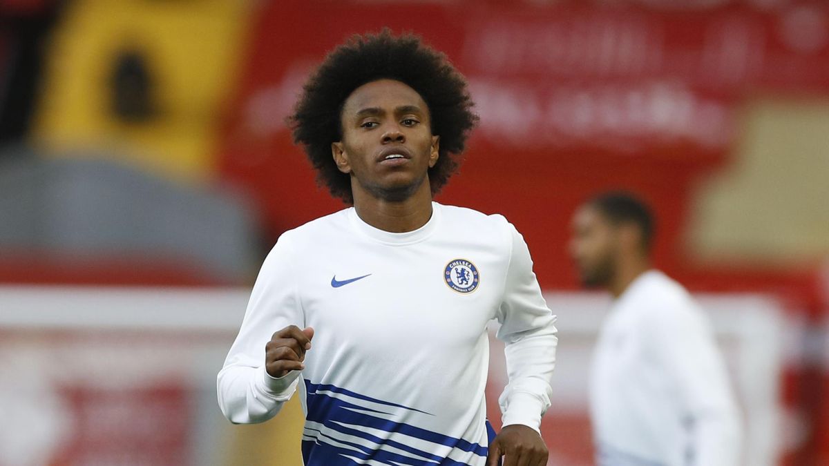 Willian of Chelsea warms up prior to during the Premier League match between Liverpool FC and Chelsea FC at Anfield on July 22, 2020 in Liverpool, England. Football Stadiums around Europe remain empty due to the Coronavirus Pandemic as Government social d