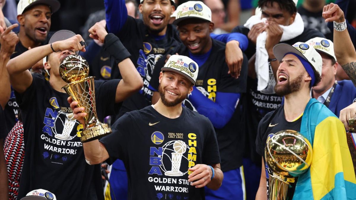 Stephen Curry #30 and Klay Thompson #11 of the Golden State Warriors celebrate after defeating the Boston Celtics 103-90 in Game Six of the 2022 NBA Finals at TD Garden on June 16, 2022 in Boston