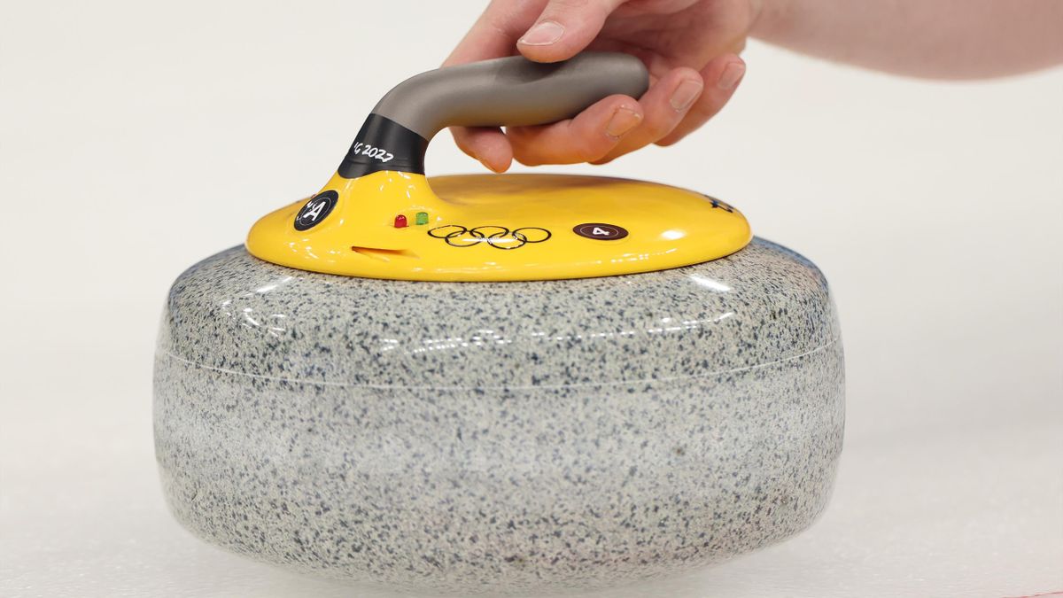A curling stone is seen during the curling mixed doubles round robin