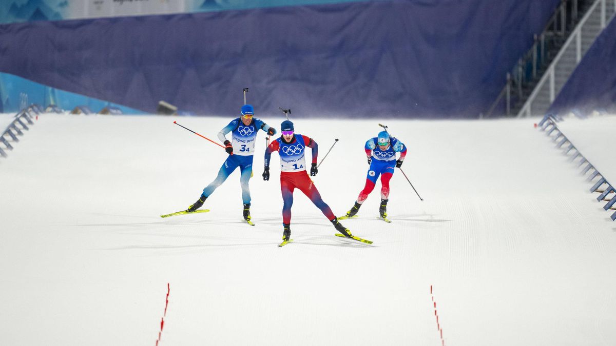 Winter Olympic Games: Johannes Thingnes Bö (Norway), Quentin Fillon Maillet (France) and Eduard Latypov (ROC) fight for Gold