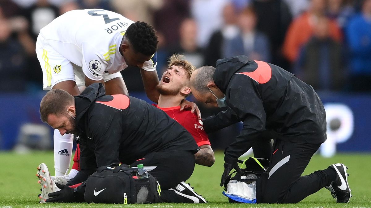 Harvey Elliott of Liverpool receives medical treatment during the Premier League match between Leeds United and Liverpool