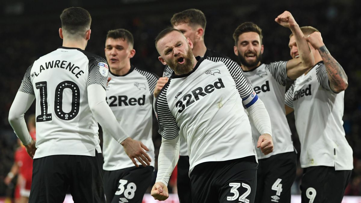 Wayne Rooney of Derby celebrates scoring the opening goal from a penalty during the Sky Bet Championship match against Fulham at Pride Park Stadium on February 21, 2020 in Derby, England.