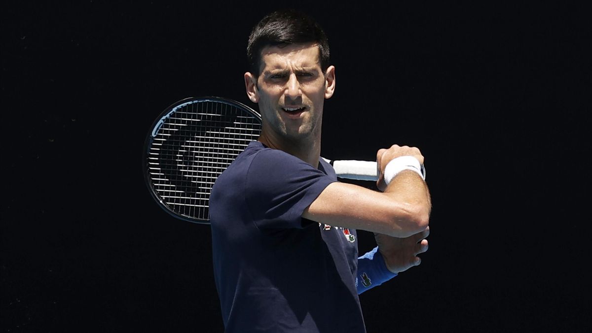Novak Djokovic of Serbia plays a forehand shot during a practice session ahead of the 2022 Australian Open at Melbourne Park on January 12, 2022 in Melbourne, Australia