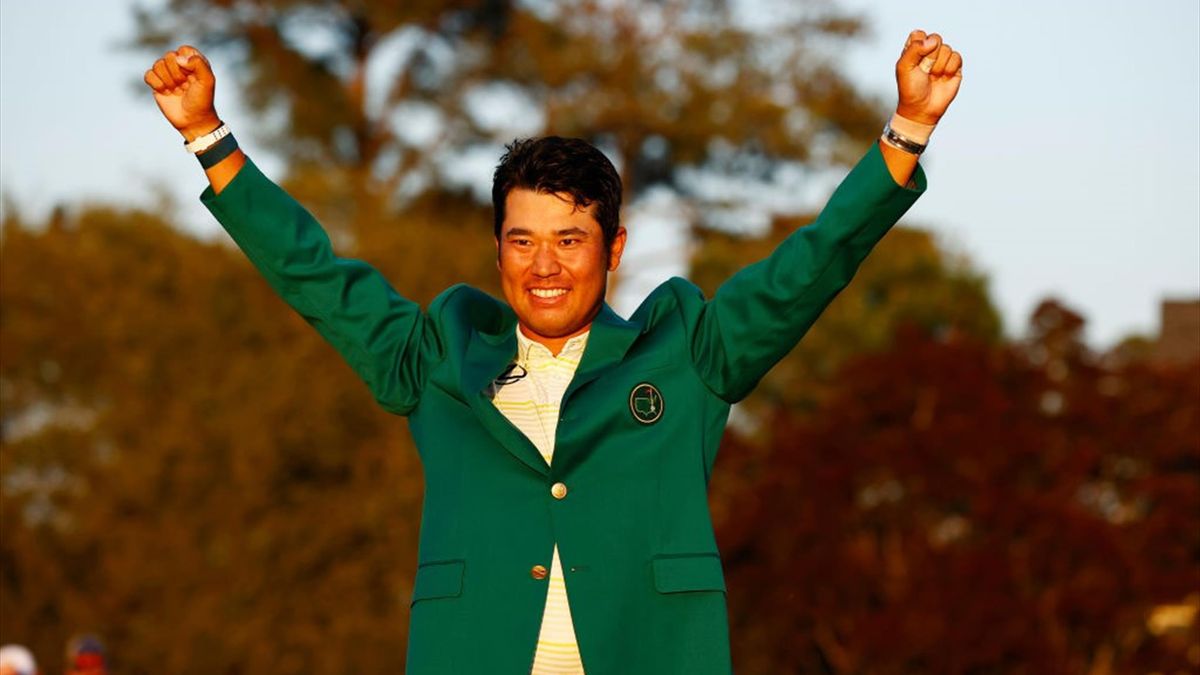Hideki Matsuyama of Japan celebrates during the Green Jacket Ceremony after winning the Masters at Augusta National Golf Club on April 11, 2021 in Augusta,
