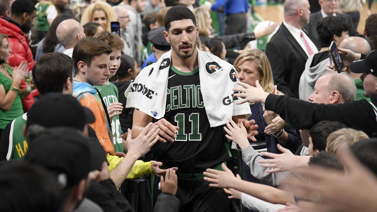 Enes Kanter #11 of the Boston Celtics hi-five fans after the game against the New Orleans Pelicans on January 11, 2020 at the TD Garden in Boston, Massachusett