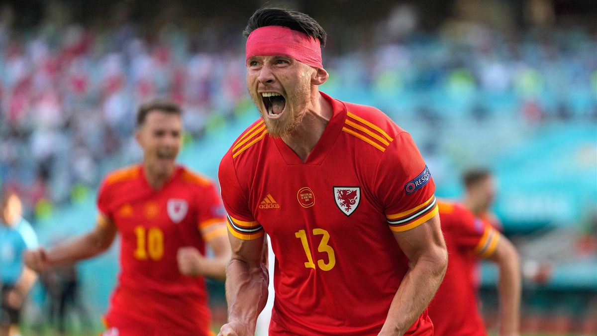 Wales' midfielder Kieffer Moore celebrates after scoring the equaliser during the UEFA EURO 2020 Group A football match between Wales and Switzerland at the Olympic Stadium in Baku on June 12, 2021.