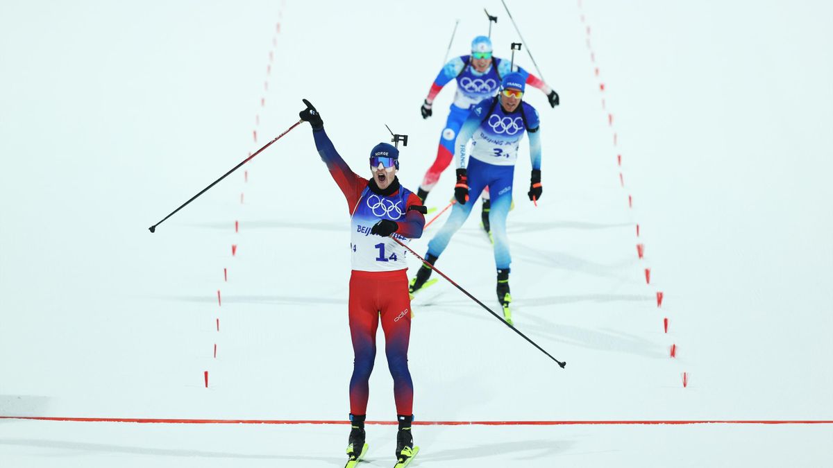 Johannes Thingnes Boe of Team Norway celebrates after winning the Biathlon Mixed Relay 4x6km during Mixed Biathlon 4x6km relay