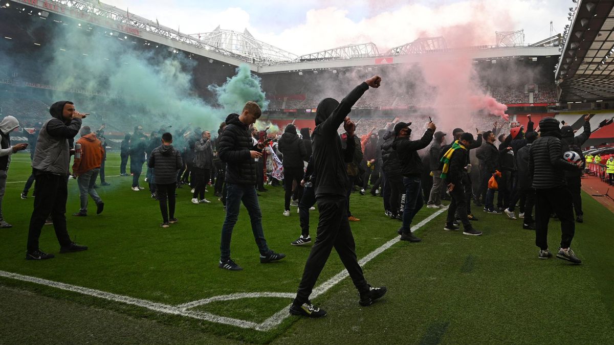 Supporters protest against Manchester United's owners, inside English Premier League club Manchester United's Old Trafford stadium in Manchester, north west England on May 2, 2021, ahead of their English Premier League fixture against Liverpool