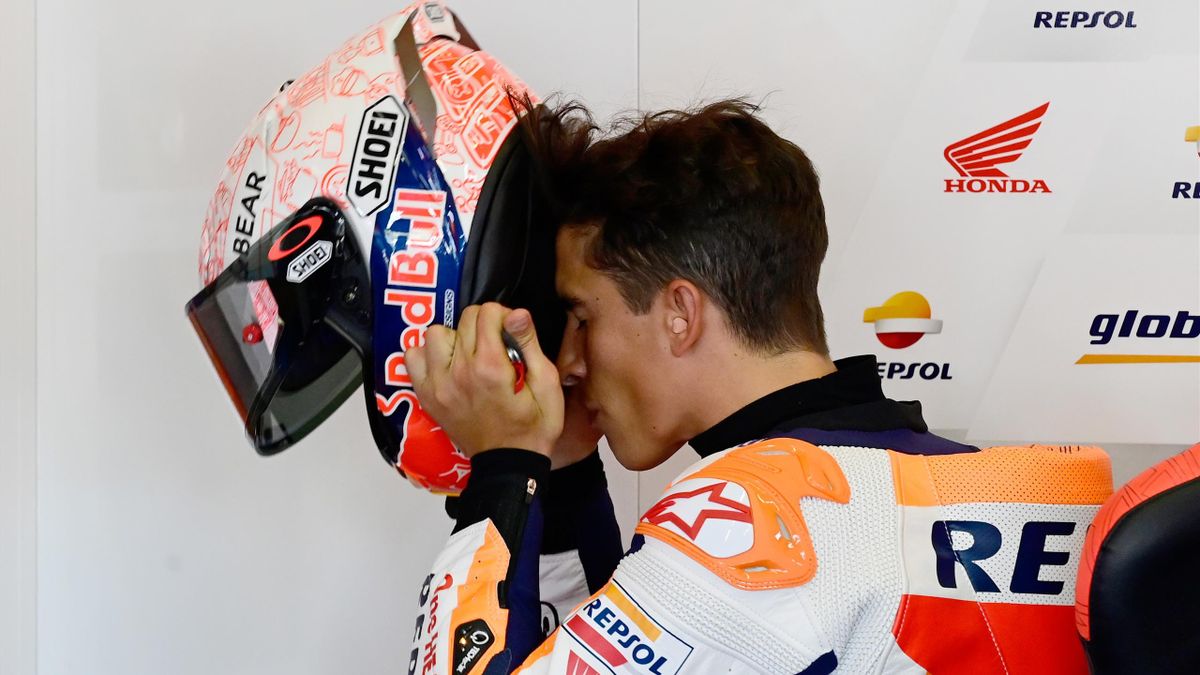 Repsol Honda Team's Spanish rider Marc Marquez puts on his helmet during the second MotoGP free practice session of the Spanish Grand Prix at the Jerez racetrack in Jerez de la Frontera on July 17, 2020