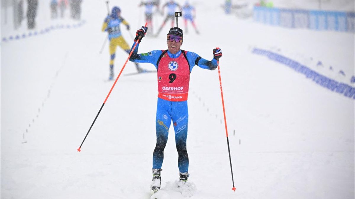 France's Quentin Fillon Maillet reacts after winning the men's 12.5km pursuit event at the IBU Biathlon World Cup in Oberhof, eastern Germany, on January 9, 2022