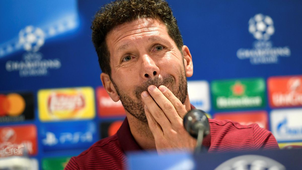 Atletico Madrid's head coach Diego Simeone attends a news conference.