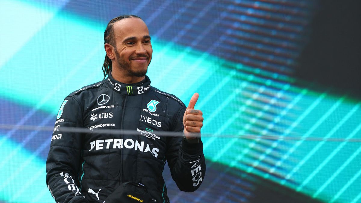 SPIELBERG, AUSTRIA - JULY 10: Third placed Lewis Hamilton of Great Britain and Mercedes celebrates on the podium during the F1 Grand Prix of Austria at Red Bull Ring on July 10, 2022 in Spielberg, Austria. (Photo by Clive Rose/Getty Images)