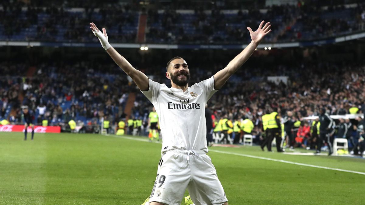  Karim Benzema celebrates a goal for Real Madrid during a Champions League match.