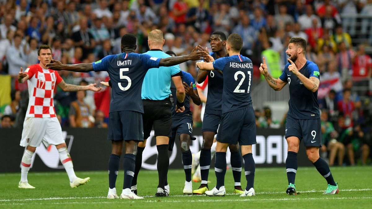 Players from France appeal to referee after Ivan Perisic of Croatia handles the ball inside the penalty area