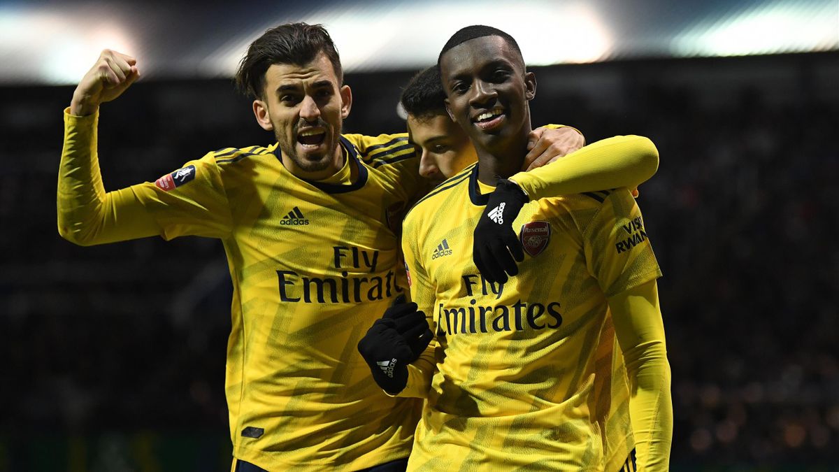 Eddie Nketiah celebrates scoring Arsenal's 2nd goal with Dani Ceballos and Gabriel Martinelli during at Fratton Park on March 02, 2020 in Portsmouth, England