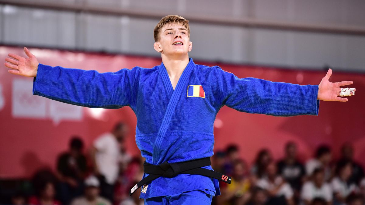 Adrian Șulcă of Romania celebrates after winning the gold medal bout of Judo Mens -82 Kg during day 2 of Buenos Aires 2018 Youth Olympic Games at Asia Pavilion in the Youth Olympic Park