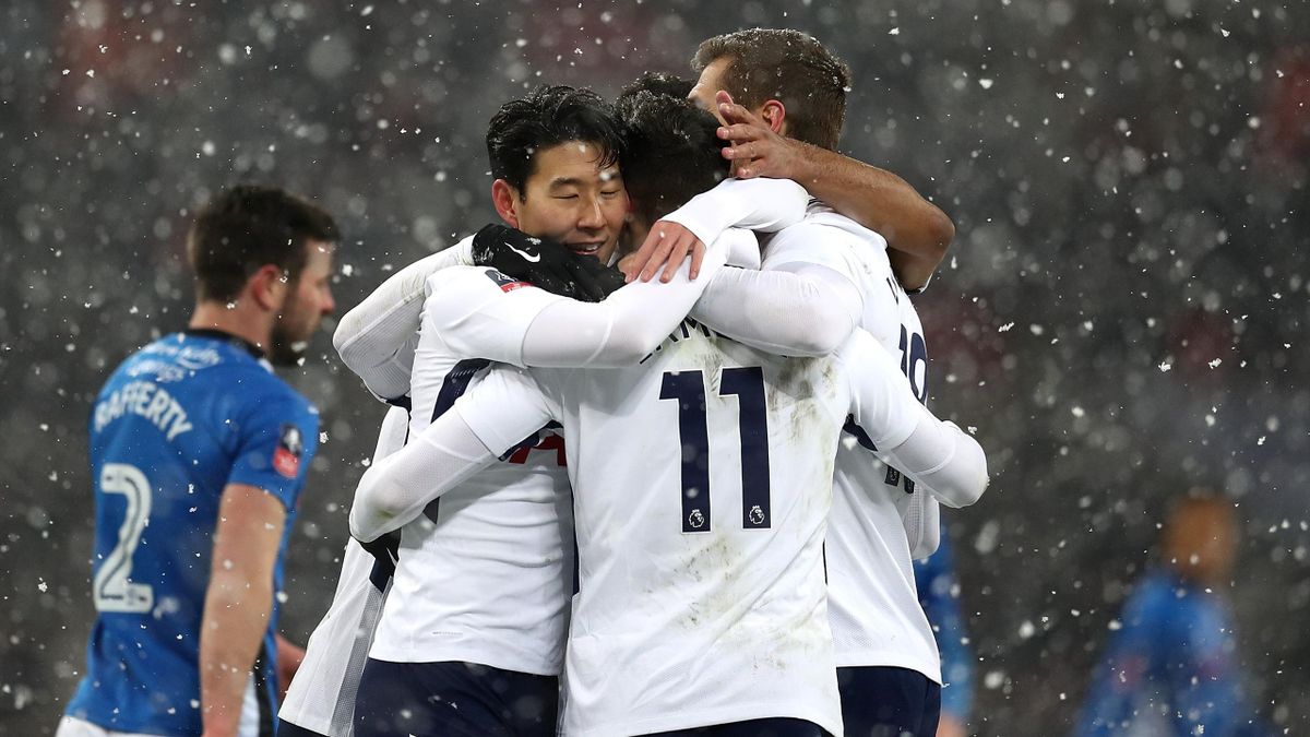 Son Heung-min of Tottenham celebrates with team mates after scoring his team's fifth goal of the game during The Emirates FA Cup Fifth Round Replay match between Tottenham Hotspur and Rochdale on February 28, 2018 in London, United Kingdom.