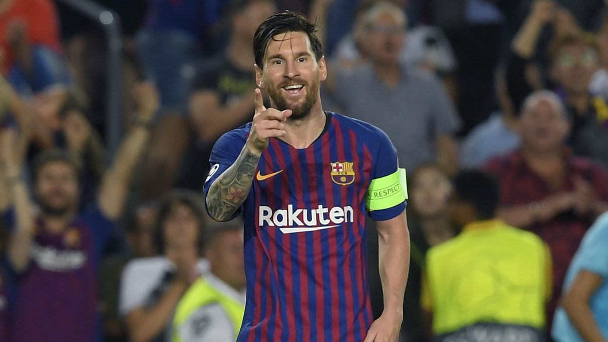 Barcelona's Argentinian forward Lionel Messi celebrates after scoring his third goal during the UEFA Champions' League group B football match FC Barcelona against PSV Eindhoven at the Camp Nou stadium in Barcelona on September 18, 2018.