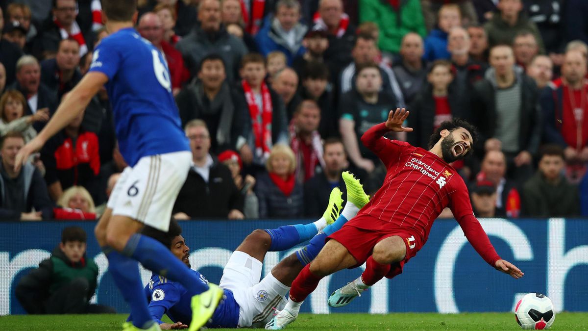 Hamza Choudhury of Leicester City collides with Mo Salah of Liverpool during the Premier League match at Anfield on October 05, 2019.