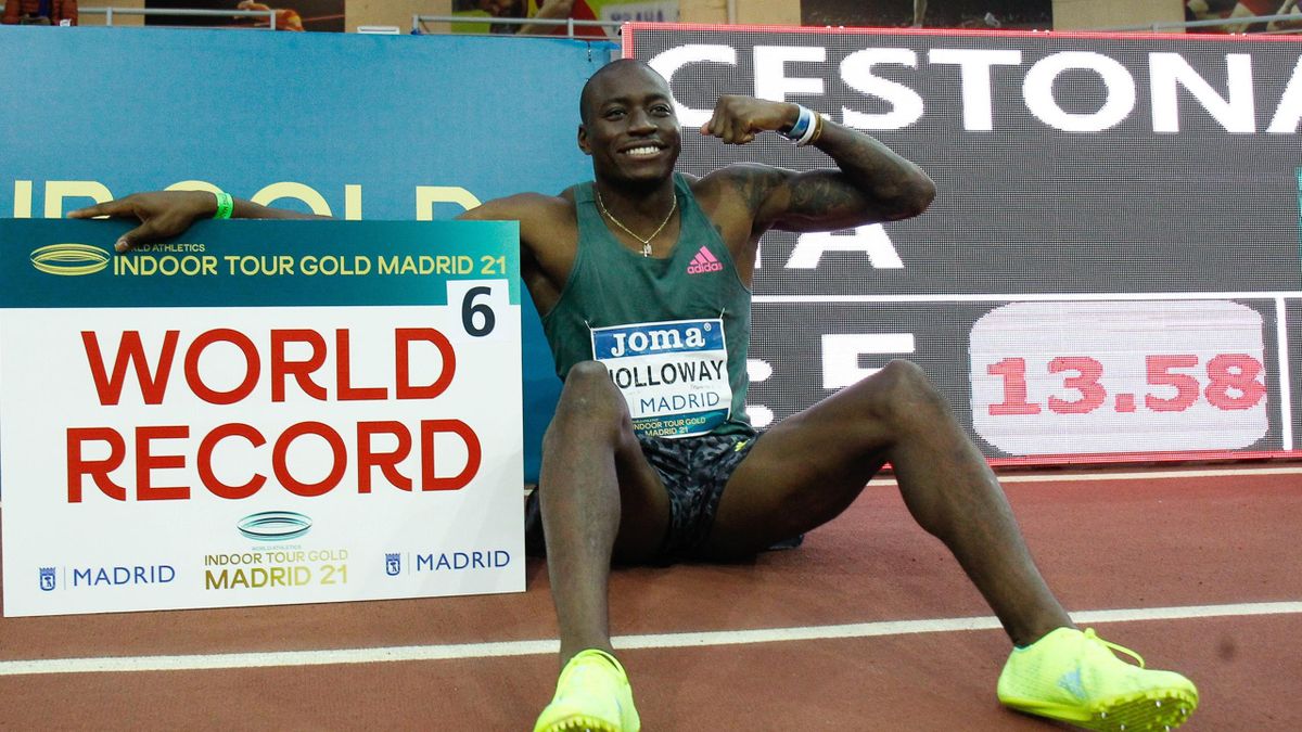 Grant Holloway celebrates breaking the indoor 60m hurdles world record