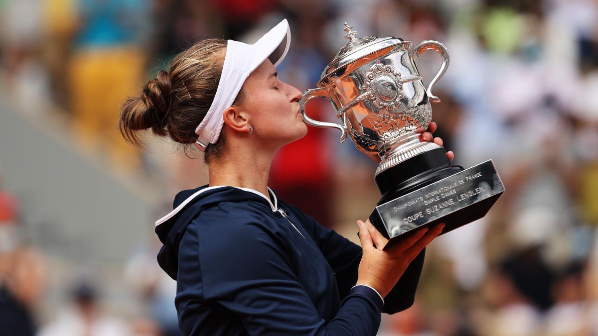 Match Winner Barbora Krejcikova of Czech Republic kisses the winners trophy after the Women’s final on day fourteen of the 2021 French Open at Roland Garros on June 12, 2021 in Paris,