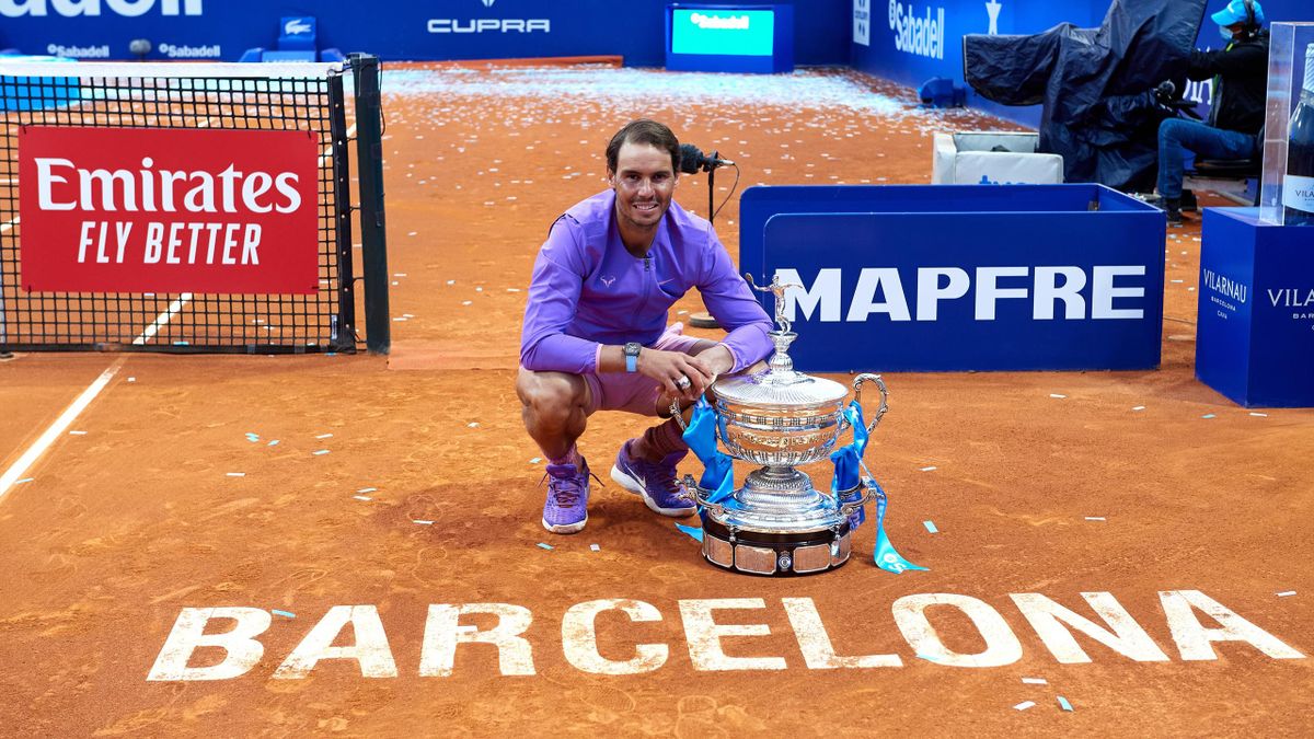 Rafael Nadal of Spain poses with the trophy after his victory against Stefanos Tsitsipas of Greece in their final match during day seven of the Barcelona Open Banc Sabadell 2021 at Real Club de Tenis Barcelona on April 25, 2021 in Barcelona, Spain.