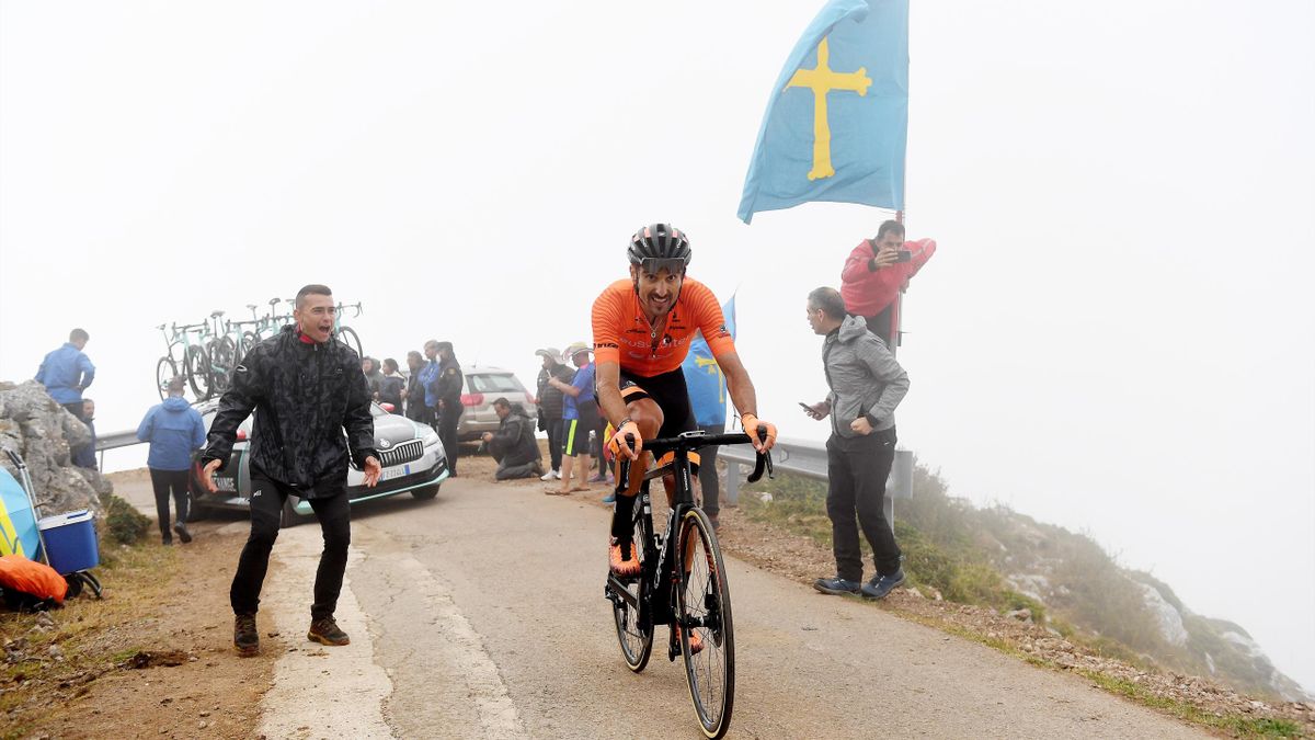 Luis Ángel Maté Mardones of Spain and Team Euskaltel - Euskadi competes while fans cheer during the 76th Tour of Spain 2021