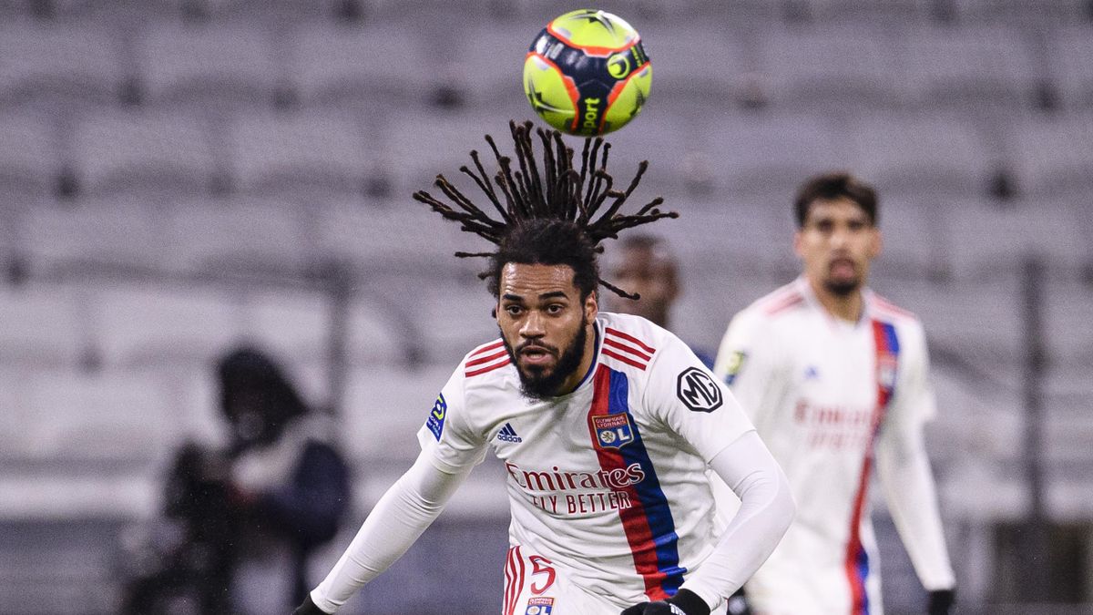 Jason Denayer of Lyon chases the ball during the Ligue 1 Uber Eats match between Olympique Lyon and Stade de Reims at Groupama Stadium on December 1, 2021 in Lyon, France.