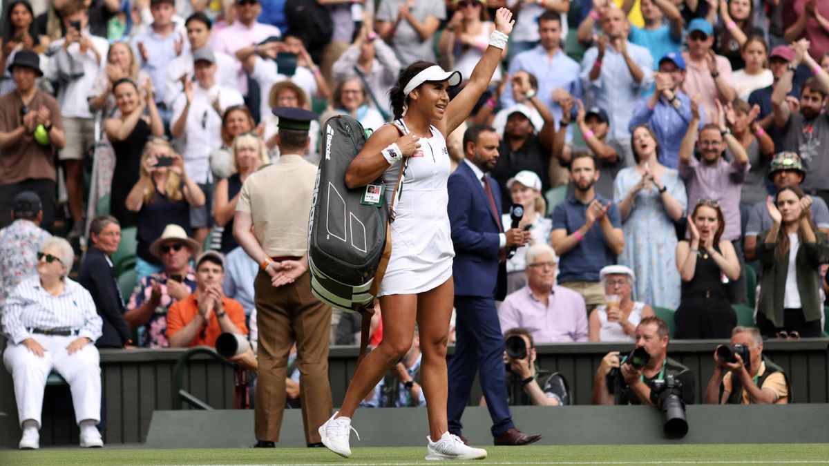 Heather Watson of Great Britain acknowledges spectators upon leaving the court following their Women's Singles Fourth Round match against Jule Niemeier of Germany on day seven of The Championships Wimbledon 2022.