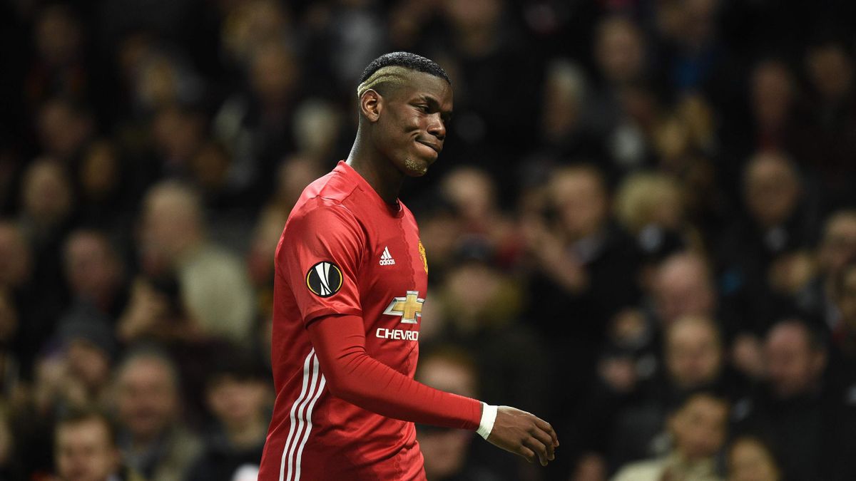 Manchester United's French midfielder Paul Pogba leaves the pitch injured during the UEFA Europa League round of 16 second-leg football match between Manchester United and FC Rostov at Old Trafford stadium in Manchester
