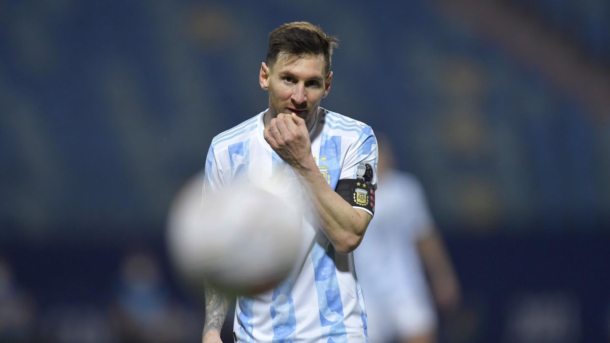 Lionel Messi of Argentina looks at the ball during a quarter-final match of Copa America Brazil 2021 between Argentina and Ecuador at Estadio Olimpico on July 03, 2021 in Goiania, Brazil