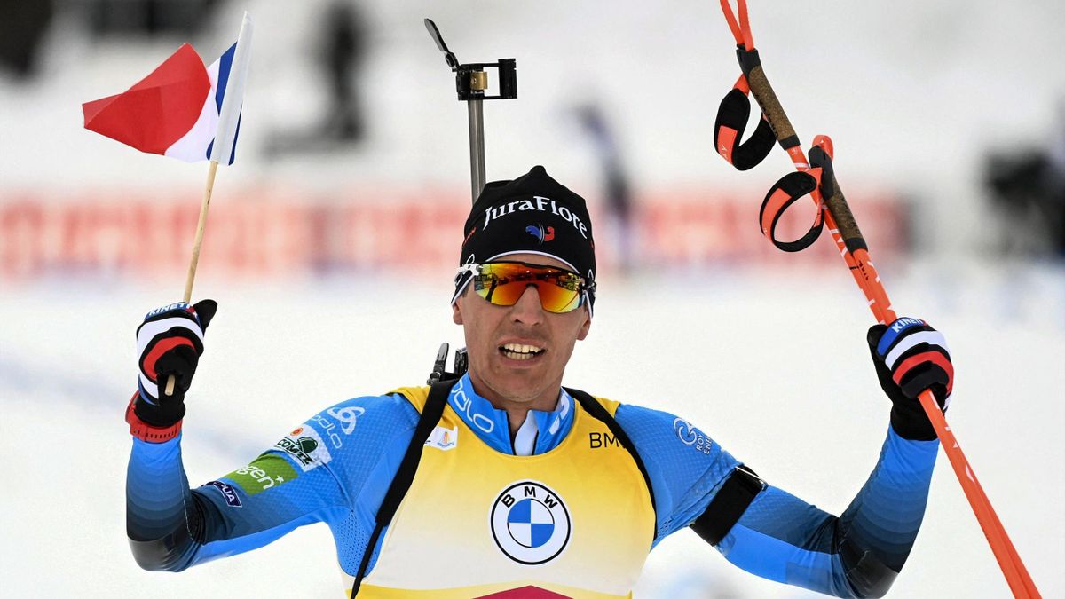 Quentin Fillon Maillet of France celebrates after winning the Men's Pursuit 12,5km competition of the IBU World Cup Biathlon event in Kontiolahti, Finland