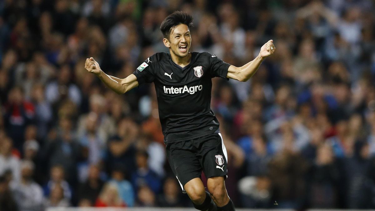Takayuki Seto celebrates after West Ham's Angelo Ogbonna (not pictured) scored an own goal and the second goal for Astra