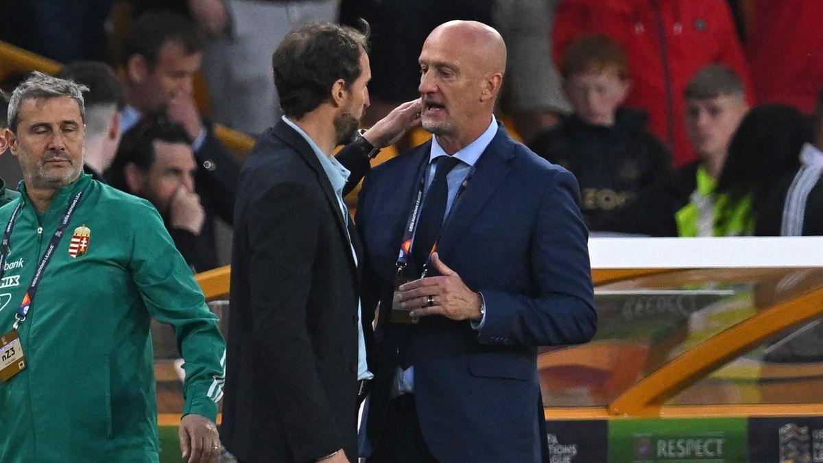 Hungary's coach Marco Rossi (R) consoles England's manager Gareth Southgate (L) after the UEFA Nations League, league A group 3 football match between England and Hungary at Molineux Stadium in Wolverhampton, central England on June 14, 2022. Hungary won