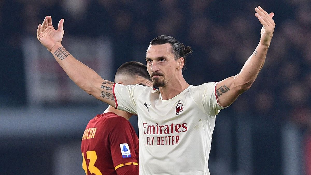 Zlatan Ibrahimovic of AC Milan celebrates after scoring a goal during Italian Serie A soccer match between AS Roma and AC Milan at Stadio Olimpico