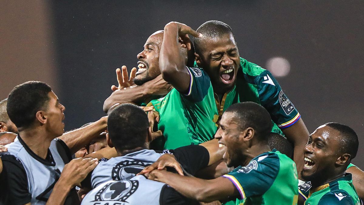Comoros' forward Ahmed Mogni (C) celebrates with teammates after scoring his team's second goal during the Group C Africa Cup of Nations (CAN) 2021 football match between Ghana and Comoros at Stade Roumde Adjia in Garoua on January 18, 2022.