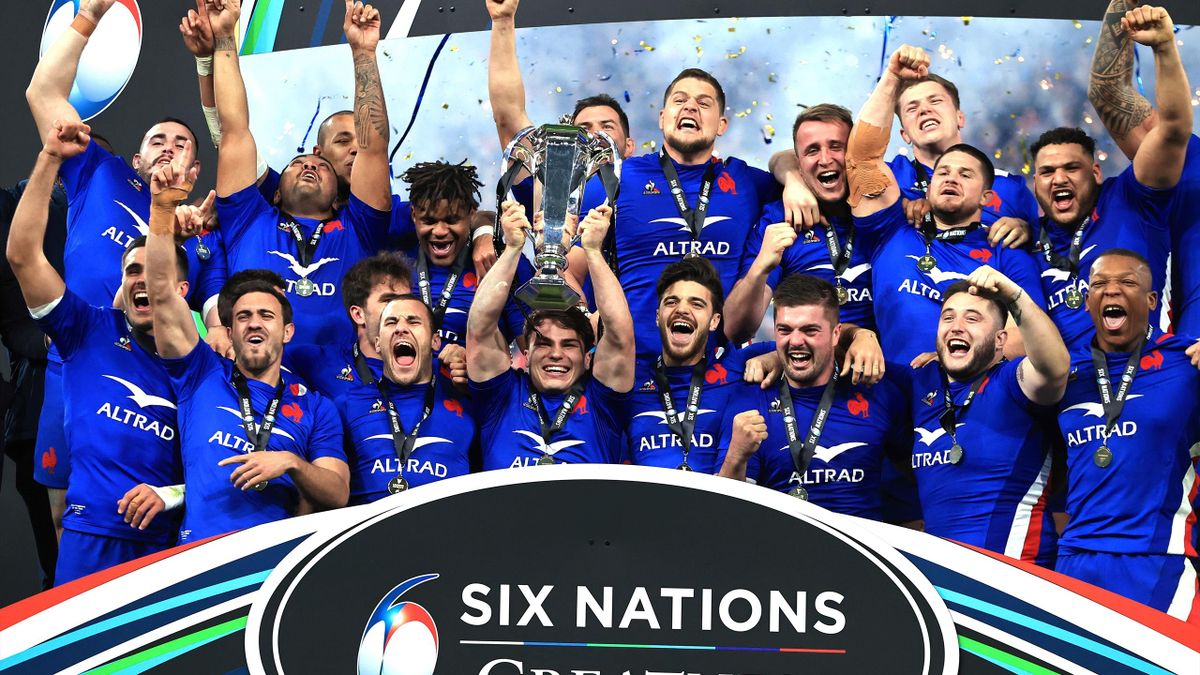 Antoine Dupont of France lifts the Six Nations Trophy with teammates after victory in the during the Guinness Six Nations Rugby match between France and England at Stade de France on March 19, 2022 in Paris, France